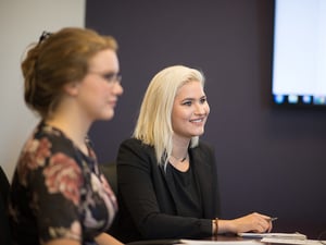 Image of students interacting with business professionals