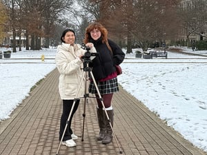 Williams (left) prepares for the opening shot of her film, “Threshold,” with friend Katie Koeppl ’26.