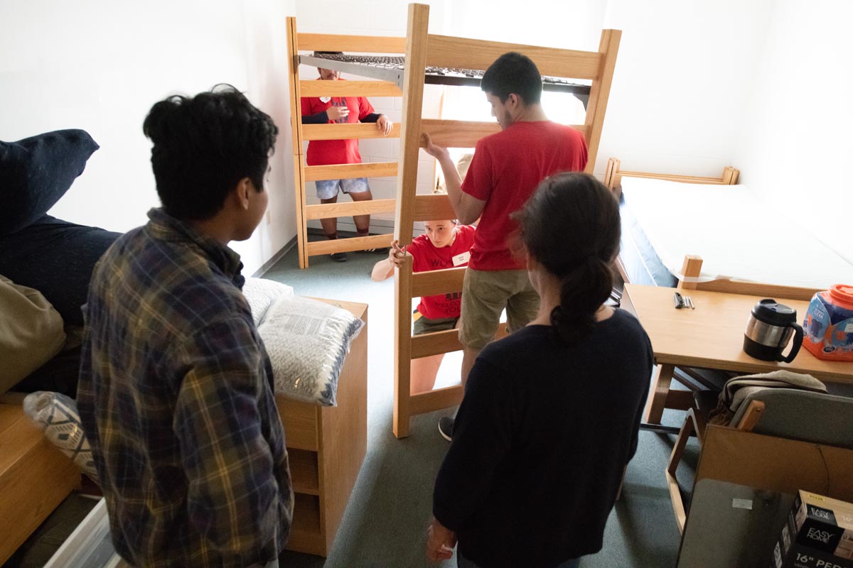 Students lofting a bed