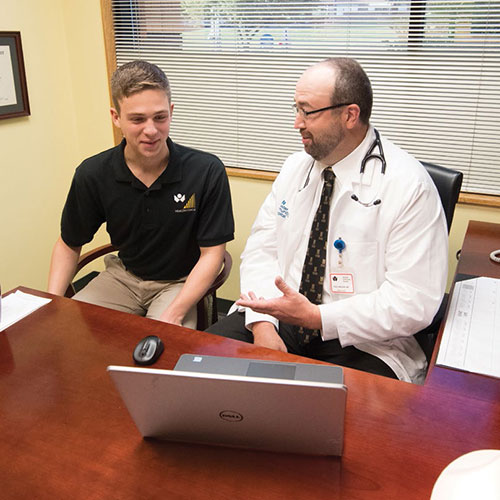 Scott Perkins ’20 collaborated with Dr. Paul Nielsen ’95 (pictured) and Dr. Amy Jolliff, co-medical directors of the Wooster Community Care Network, and Alex Davis, director, to evaluate the outcomes of the Health Coach program.