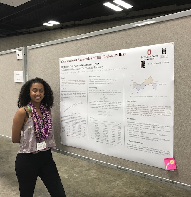 Issak with her award-winning research poster presentation