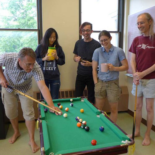 Professors Niklas Manz (left) and John Lindner (far right) along with Fish Yu ’21, Chase Fuller ’19, and Margaret McGuire ’20 in the computational physics lab during summer 2019