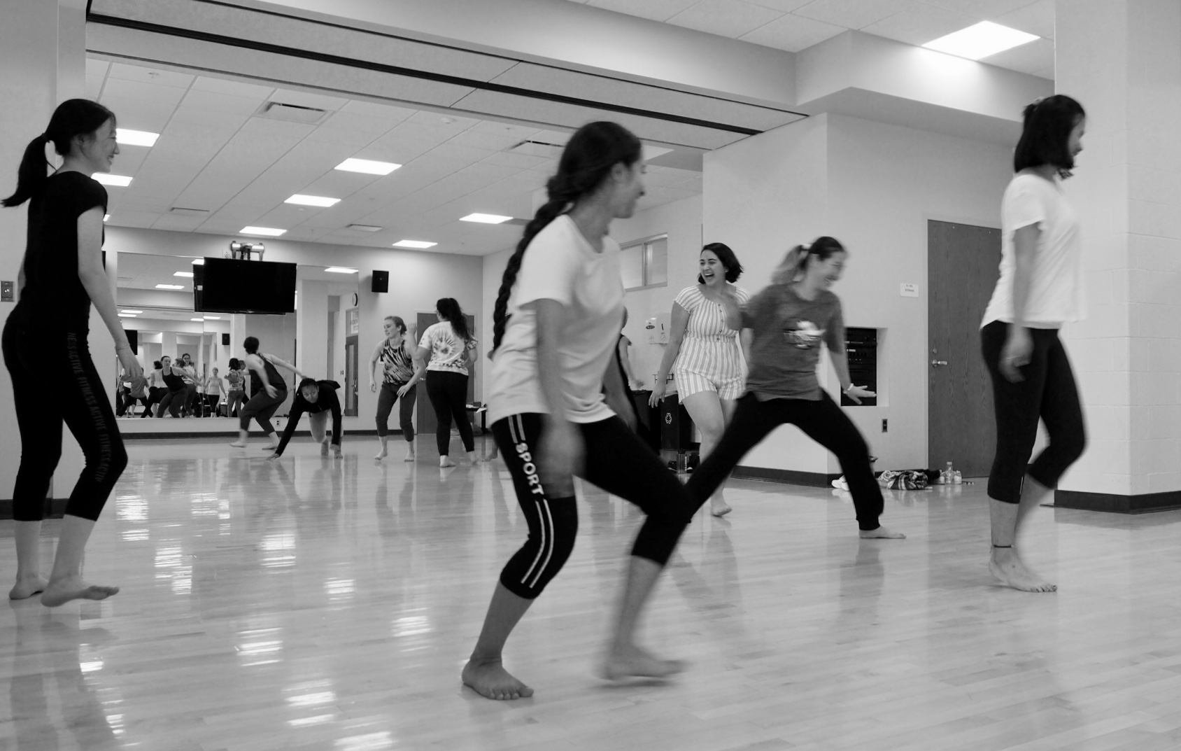 Students work on techniques in dance studio
