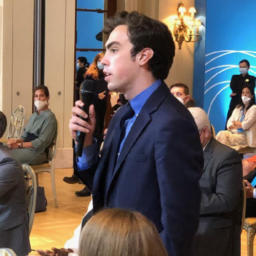 Adam Hinden, College of Wooster student, asks a question at a panel at the Athens Democracy Forum