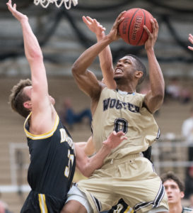 basketball player goes up for a lay-up at The College of Wooster