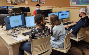 students at The College of Wooster sit at computers using MOVE suite software
