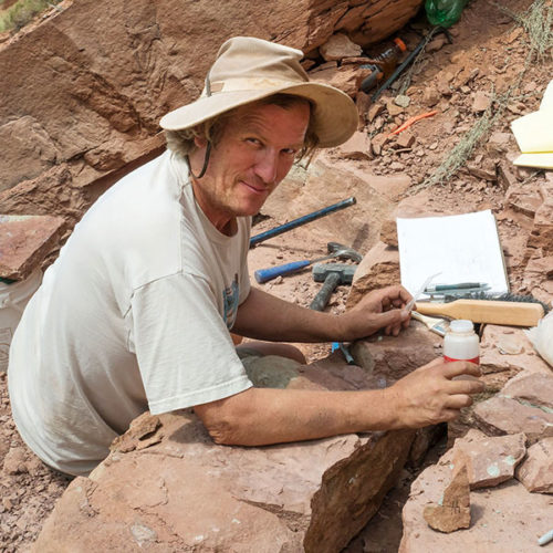 Dr. Andrew R.C. Milner at an archeological dig