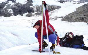 Lauren Vargo '13 measures glacier mass change on Brewster Glacier in 2018.