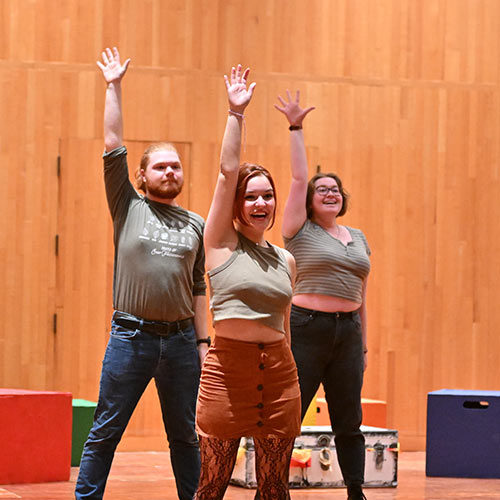 Students performing in "You're a Good Man, Charlie Brown"