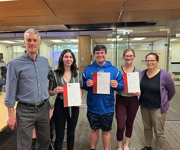 Jennifer Renner ’24, Thomas Pitney ’24, and Antonia Owens Detwiler ’24, all completed the Peace Corps Prep program and global impacts pathway at Wooster, pictured here with Harry Gamble, Inez K. Gaylord Professor of French and Francophone Studies, and Rebecca Webb, coordinator of the pathways programs.