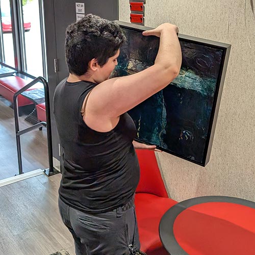 Kaleb Sanchez '26 learned useful skills related to preserving art pieces. Photo provided by subject.