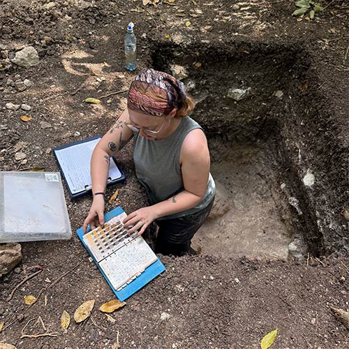Ryann Taylor '26 conducting soil tests within a test site. Photo provided by subject.