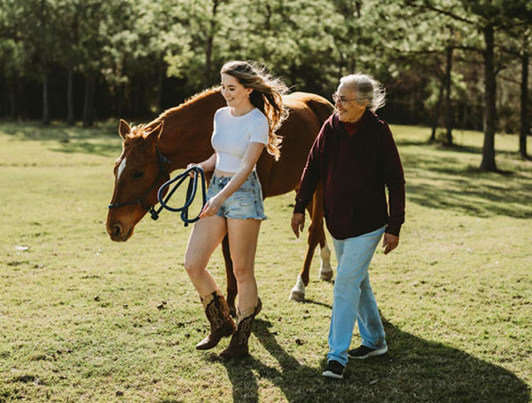 Bella Coenen volunteers Dream Catcher Stables, a nonprofit in her hometown of Houston where she has taught horseback riding to children with special needs.